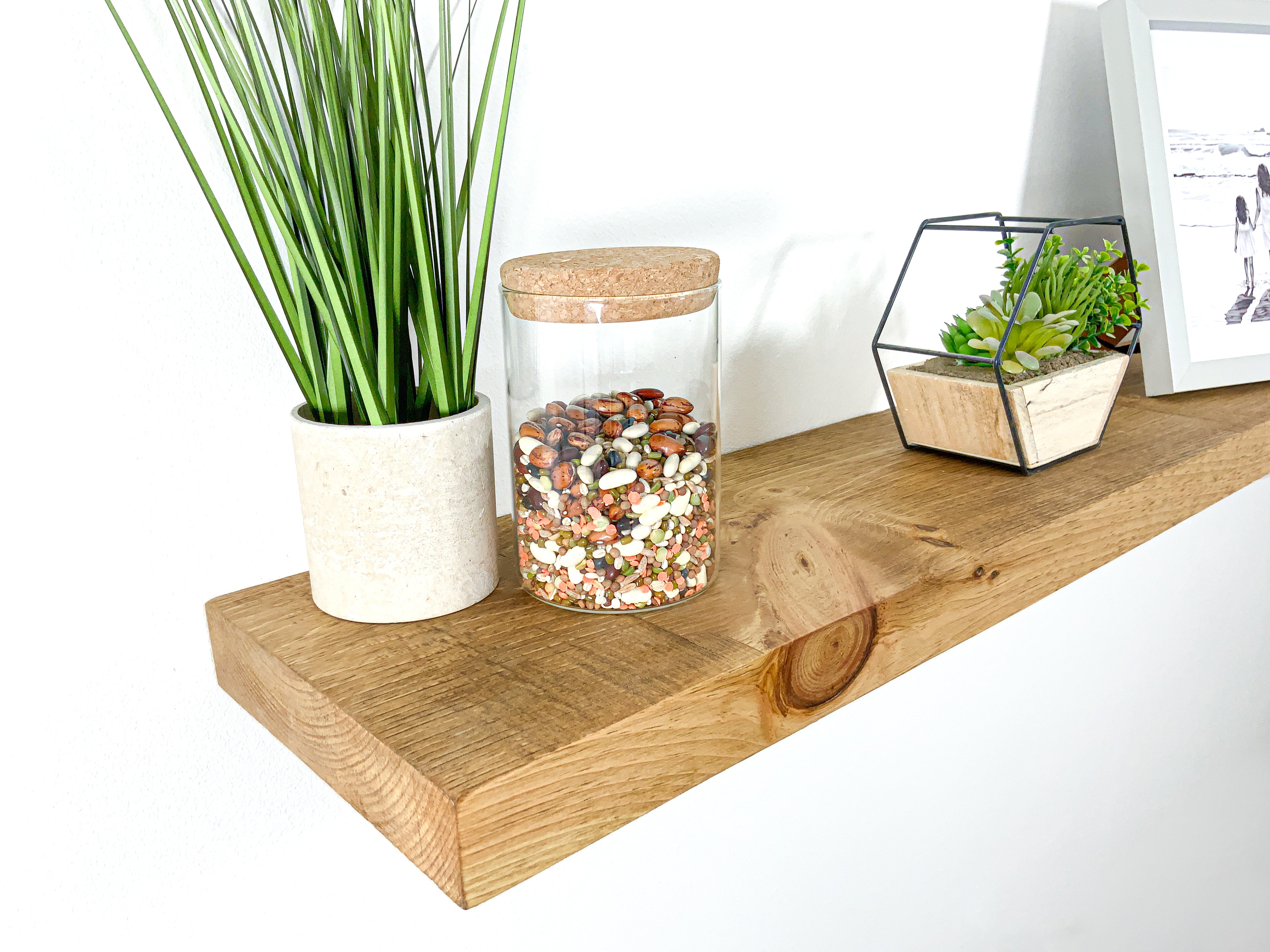 Thick light rustic pine floating shelf side close up