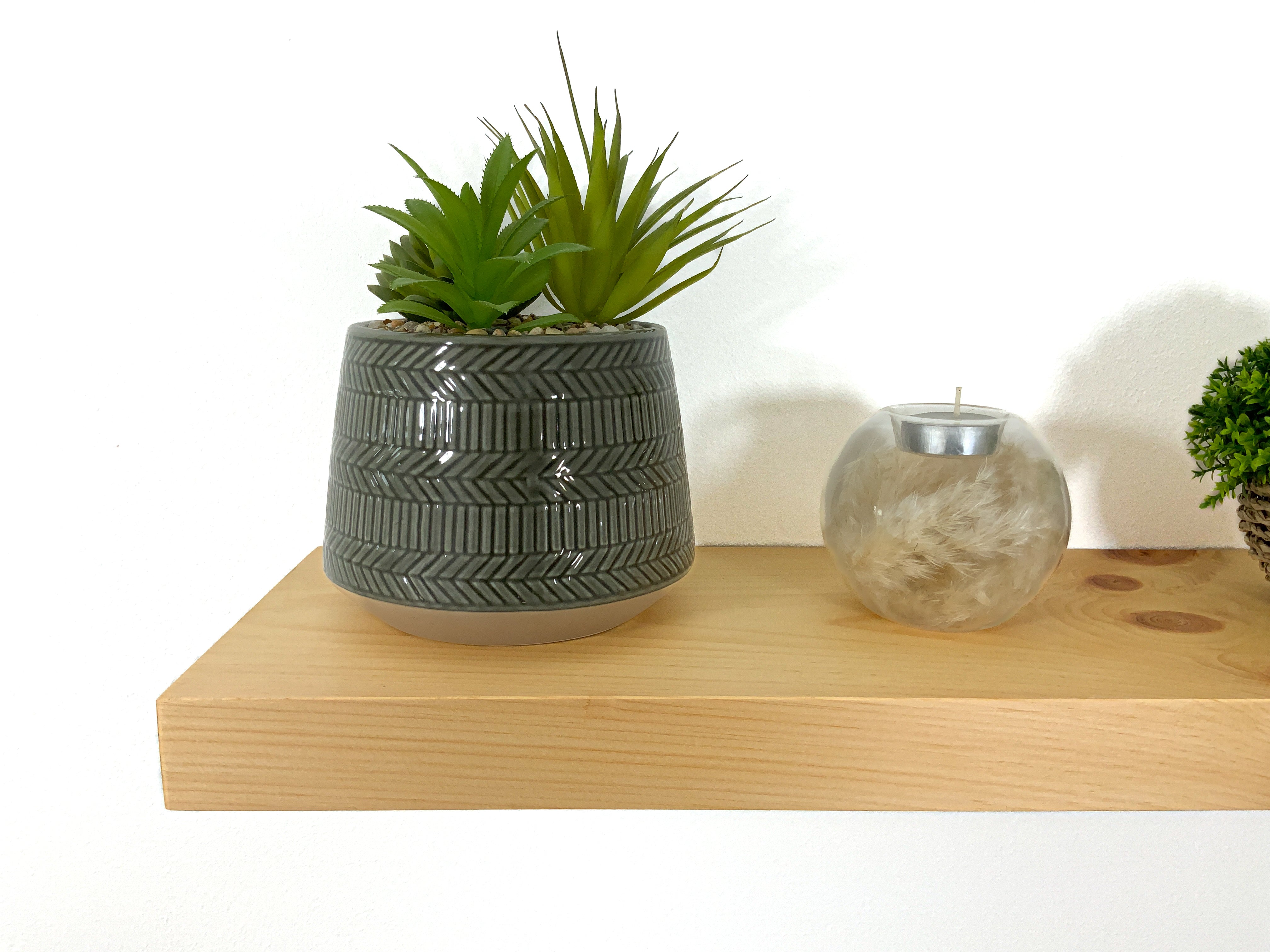Thick modern pine floating shelf close front