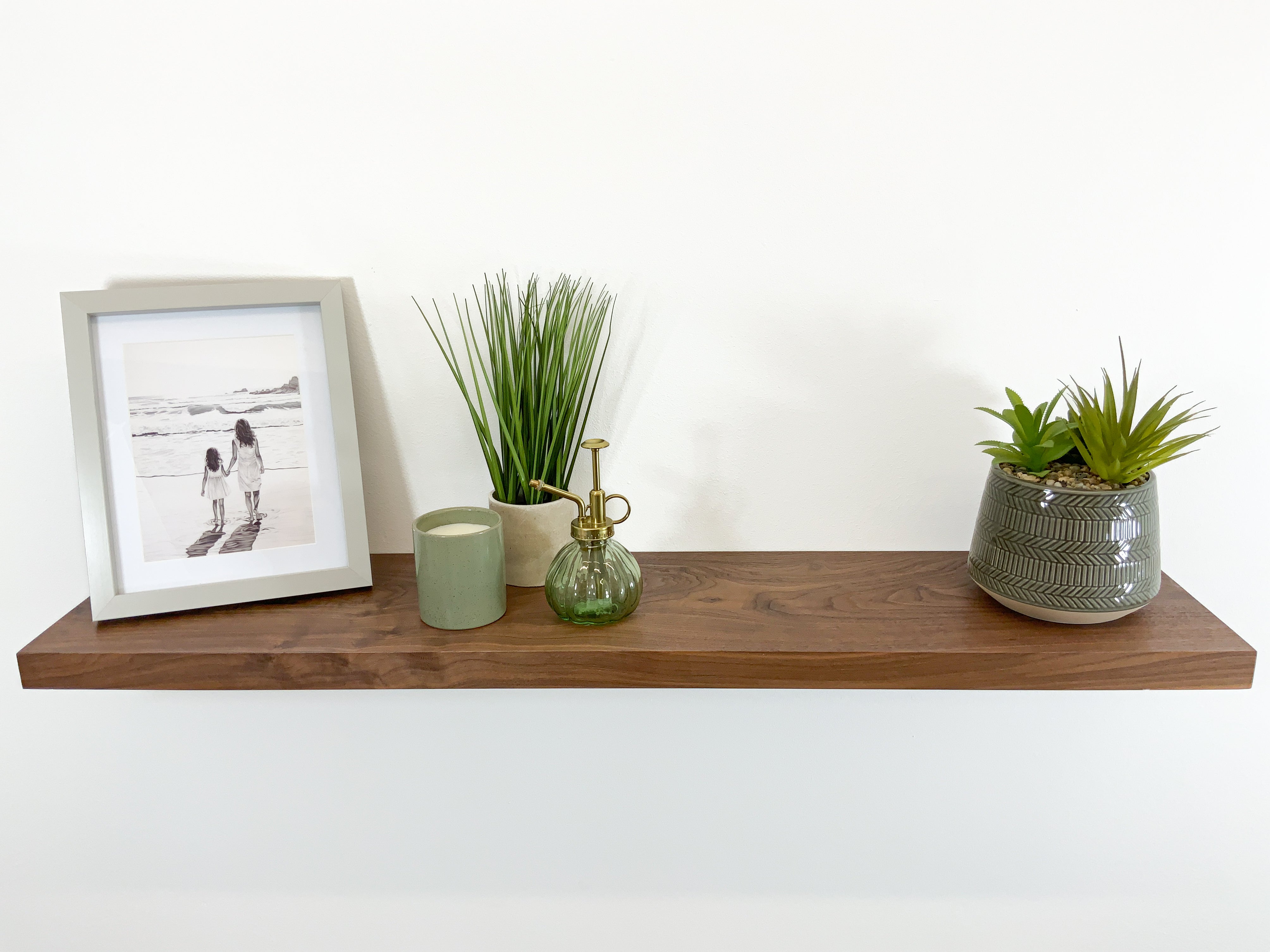 Thick modern walnut shelf front view